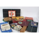 Collection of various board games, to include solitaire boards, Quintro, Scrabble, Monopoly, a bag