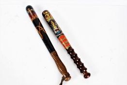 Two painted constabulary truncheons, one Victorian example depicting a crown and VR in gold with a