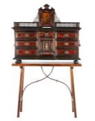 A Flemish Antwerp style walnut and tortoiseshell cabinet, 17th Century elements, the cabinet