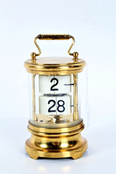 20th century brass cased perpetual calendar, of cylindrical form, 12.5cm high