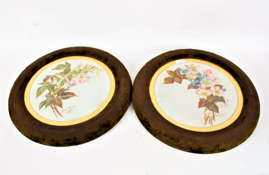Pair of late Victorian porcelain plaques, each with hand painted flowers by Cecelia Thomas and dated