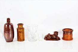 Victorian wine glass, together with a Victorian measuring glass, salt glazed lion, two stoneware