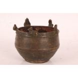 Indian bronze censer, the rim modelled with animals, the body with engraved text, 10cm diameter