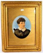 Late 19th century British School, portrait of lady in a black dress, overpainted print, housed in an