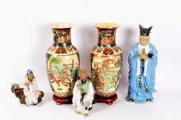 Three Chinese pottery figures, the tallest 35cm, together with a pair of  Chinese vases decorated