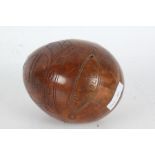 19th Century scrimshaw coconut, the body engraved with a profile portrait, pair of shaking hands,