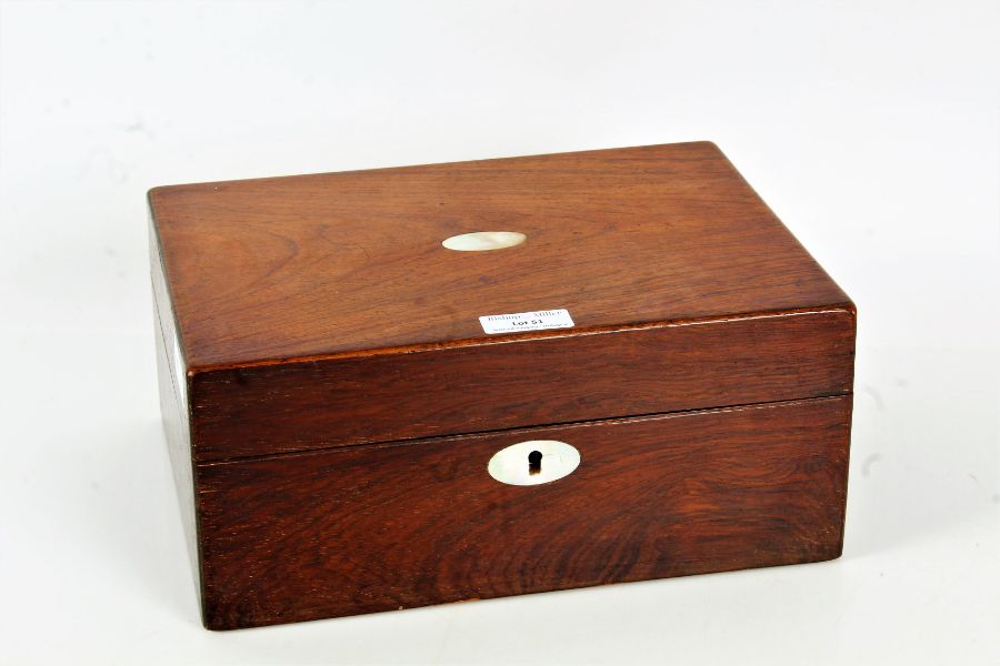 A 20th century oak and mother of pearl jewellery box, the oak box with a mother of pearl key hole