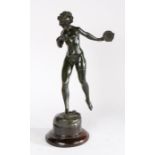 Late 19th Century bronze by Lina Muller, depicting a dancing nude lady holding a tambourine in her