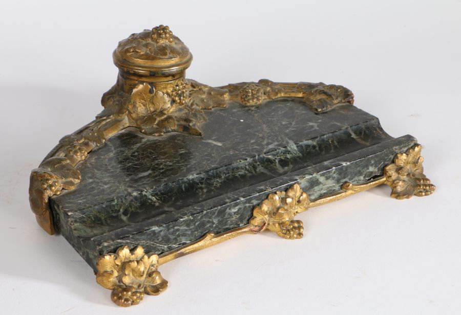 French gilt bronze and marble desk stand, the gilt bronze inkwell and mounts with cast fruiting vine