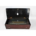 19th Century continental cylinder music box, the marquetry inlaid case with depiction of a bird on a