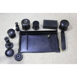 Ebony dressing table set, consisting of tray, pair of candlesticks, four pots and covers, pin