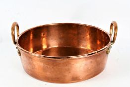 Large 19th/20th century copper preserve pan with A&N CSL stamped to the base, with a pair of