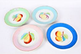A set of four 20th century hand painted plates with various colour rims and depicting various