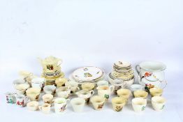 A large collection of nursery rhyme china to include various manufacturers also to include cups