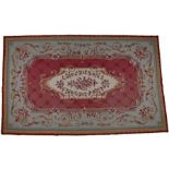 Aubusson style wool carpet, the central cream field with pink and red roses surrounded by flower