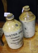 Two Stoneware advertising bottles, 'Minister Bros., Botanical Brewers, Ipswich 1932, 28cm tall