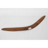 20th century wooden boomerang of typical form, 65cm long