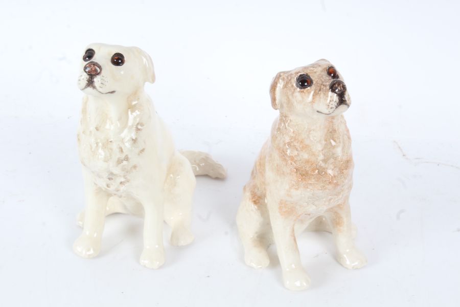 Two Winstanley pottery seated dogs, each with glass eyes, size 3, 19cm high (2)