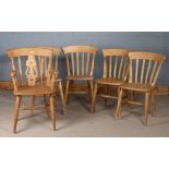 Five beech slat back kitchen chairs, to include one carver and four standard (5)
