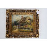 After Helen Allingham, oleograph of a thatched cottage with a figure outside, housed in an ornate