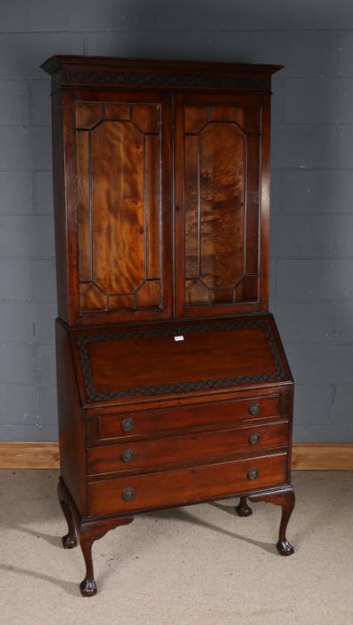 Edwardian mahogany bureau bookcase, the glazed upper section above a sloping fall enclosing a pigeon