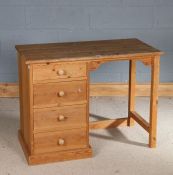 Pine desk bench, the pedestal containing four drawers, 102cm wide