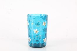20th century blue glass decorated with white flowers, 11cm high