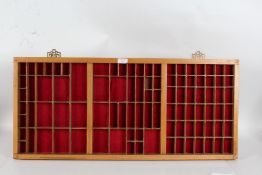 Large hanging display case with various sized sections, 83cm wide 37cm high