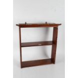 Late Victorian hanging wall shelf, with carved borders, 54.5cm wide, 57cm high