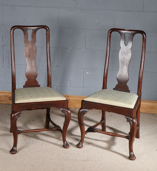 Pair of George II style mahogany dining chairs, with vase backs and a pierced top rail above