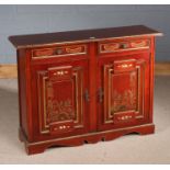 Mahogany effect side cupboard, gilt decorated in the Chinese style, fitted two short drawers above a
