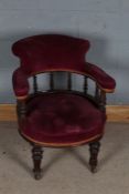 Late Victorian mahogany and upholstered tub chair, with spindled back rest and open arms, raised