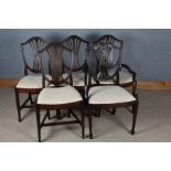 Five Hepplewhite style mahogany dining chairs, comprising four standard and one carver (5)