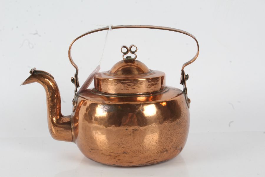 Swedish copper tea pot, with a carrying handle above a bulbous body with a swan neck spout with