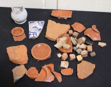 Collection of 19th century and earlier finds to include blue and white tile, terracotta tiles,