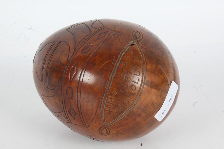 19th Century scrimshaw coconut, the body engraved with a profile portrait, pair of shaking hands,