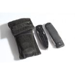 Gerber folding knife with moulded rubber handle, held in web pouch, blade 9 cm, together with a S.