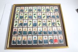 Framed set of cigarette cards showing Royal Navy uniforms and ranks, (2)