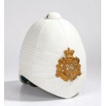 Reproduction British Foreign Service helmet with helmet plate to the  24th Regiment of Foot, liner