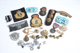 Collection of military items including, Kings crown Royal Navy Petty Officers cap badge, Guards