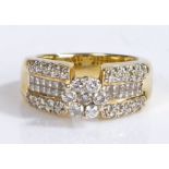 An 18ct yellow gold diamond cluster ring. Total approx. diamond carat weight: 1.05cts. Colour: H-