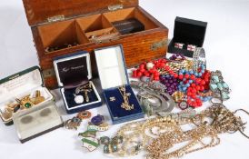 A collection of costume jewellery to include cuff-links, necklaces etc (Qty) housed within a
