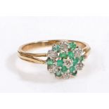 A 9 carat gold cluster ring, the head set with faux emeralds and paste, weight 2.8 grams