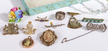 A Collection of costume jewellery to include a yellow metal mourning brooch together with Art Deco
