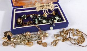 A collection of costume jewellery to include silver bangle, yellow metal jewellery to include