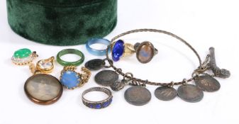 A collection of various jewellery to include mostly rings some silver two pendants, charm bracelet