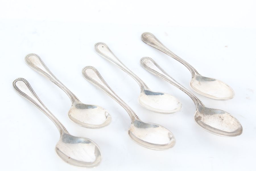 Six George V silver coffee spoons, Sheffield 1932, maker Emile Viner, with beaded handles, 2.5oz
