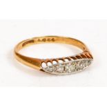 A 18 carat gold and diamond ring, the head set with five diamonds, weight 2.4 grams