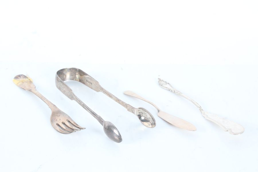 Silver, various dates and makers, to include pair of sugar tongs, two butter knives dessert fork,