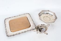 Silver plated ware to include bread board with wooden insert, octagonal pierced dish, sauceboat,